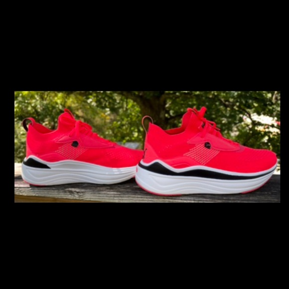 Puma Women's Softride STAKD Sneaker Orchid/Black - Picture 1 of 13